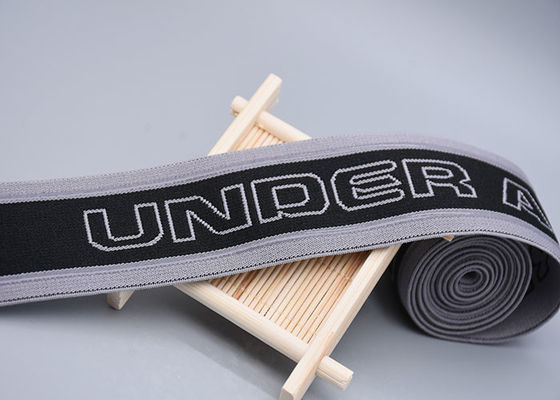 非印刷されるを用いる二重味方されたジャカード ゴムひもは透明なシリコーンのストリップを入れる