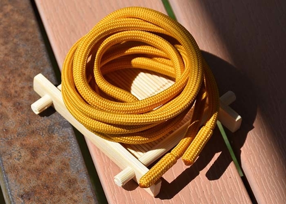 衣服5mm円形ポリエステル ドローストリングのコードの金属および生地の端