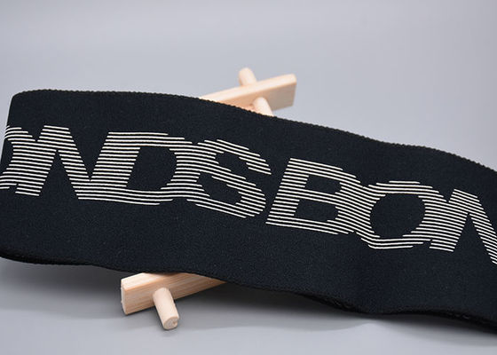 倍は印刷されたシリコーンのロゴ衣服のための100%の綿のゴムひもの味方した