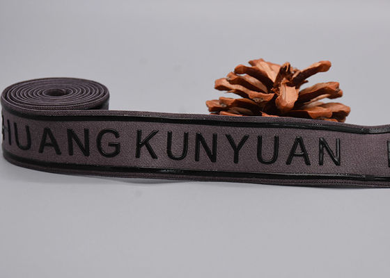 衣服は習慣によって印刷される光沢があるシリコーンのロゴのスリップのゴムひもを非使用する